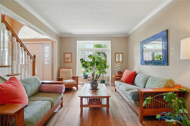 8420 Willow Glen Ct, Holland, OH 43528 - living area featuring stairway, crown molding, and wood finished floors