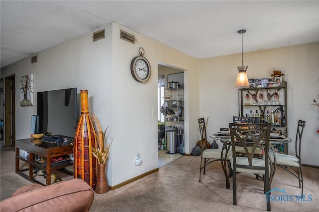1711 Brownstone Blvd, Toledo, OH 43614 - dining room with carpet flooring and baseboards