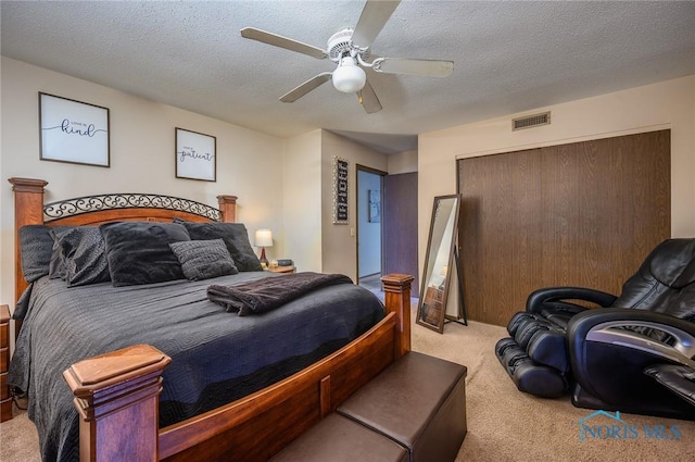 1711 Brownstone Blvd, Toledo, OH 43614 - carpeted bedroom with a ceiling fan, a textured ceiling, and a closet