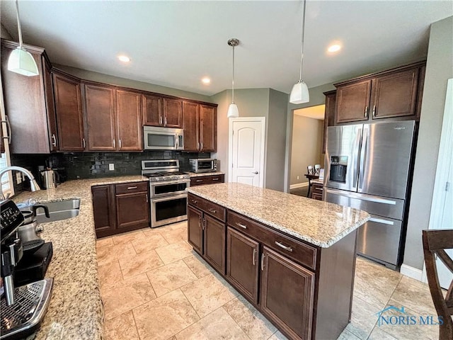 3244 Chasenwood Way, Perrysburg, OH 43551 - kitchen with appliances with stainless steel finishes, a sink, backsplash, dark brown cabinets, and recessed lighting