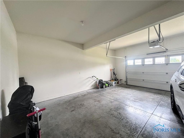 3244 Chasenwood Way, Perrysburg, OH 43551 - garage with a garage door opener and baseboards