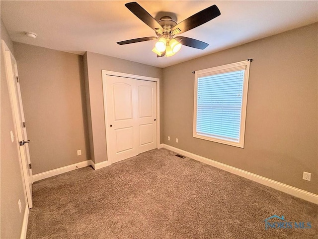 3244 Chasenwood Way, Perrysburg, OH 43551 - unfurnished bedroom featuring carpet, a closet, baseboards, and ceiling fan