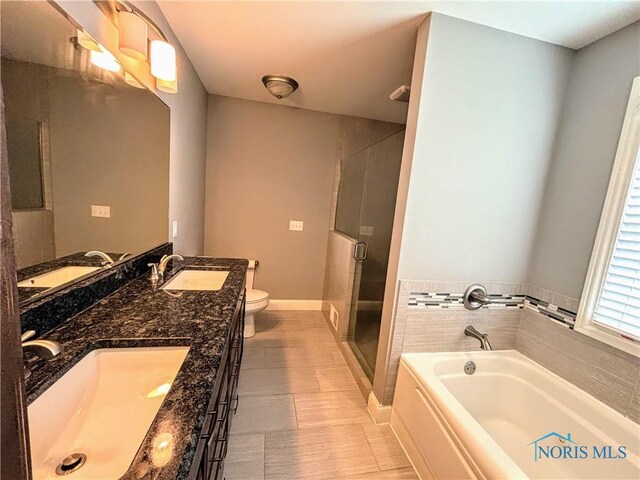 3244 Chasenwood Way, Perrysburg, OH 43551 - bathroom featuring toilet, a bath, double vanity, a stall shower, and tile patterned flooring