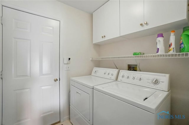 5733 Brook Cliffe Rd, Toledo, OH 43614 - washroom with separate washer and dryer and cabinet space