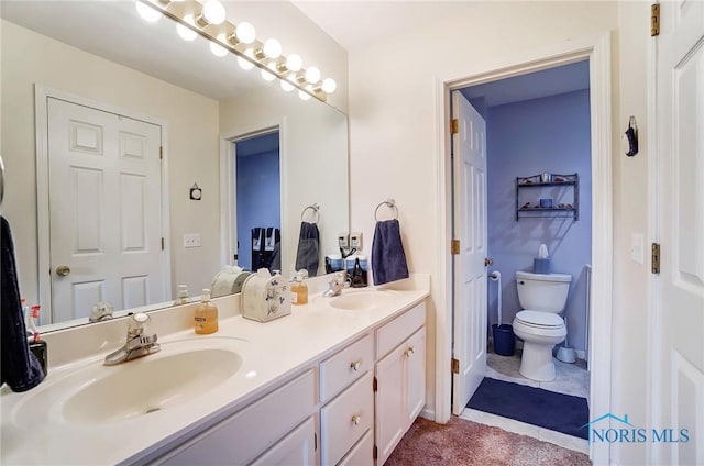 5733 Brook Cliffe Rd, Toledo, OH 43614 - full bathroom featuring double vanity and toilet