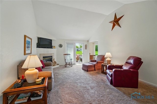 5733 Brook Cliffe Rd, Toledo, OH 43614 - living area with a glass covered fireplace, carpet floors, high vaulted ceiling, and baseboards