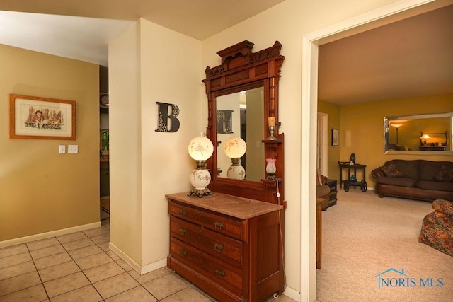 633 Hillcrest Ave, Findlay, OH 45840 - hall featuring baseboards and light tile patterned floors