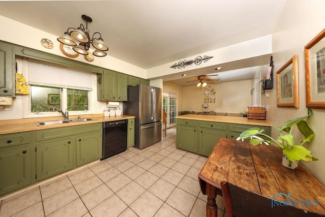 633 Hillcrest Ave, Findlay, OH 45840 - kitchen featuring green cabinetry, black dishwasher, a sink, and freestanding refrigerator