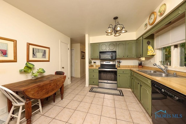 633 Hillcrest Ave, Findlay, OH 45840 - kitchen featuring green cabinets, black appliances, a sink, light countertops, and light tile patterned flooring