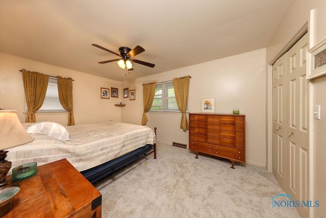 633 Hillcrest Ave, Findlay, OH 45840 - bedroom featuring a closet, light colored carpet, baseboards, and ceiling fan