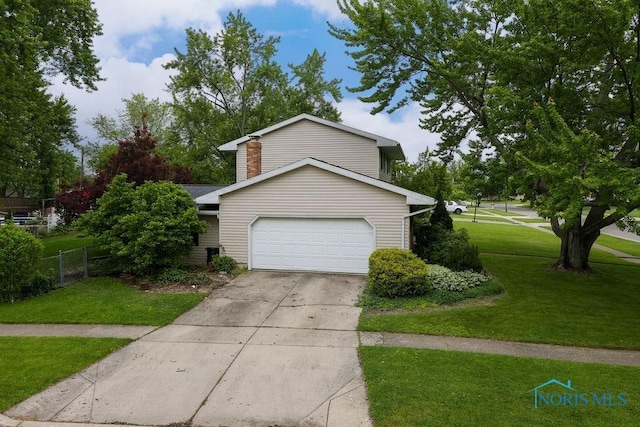 633 Hillcrest Ave, Findlay, OH 45840 - view of front of home featuring a garage and driveway