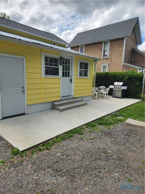 815 S Blanchard St, Findlay, OH 45840 - rear view of house featuring a patio