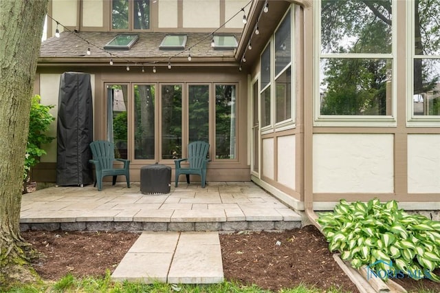 2426 Gibley Park Rd, Toledo, OH 43617 - rear view of property with stucco siding and a patio