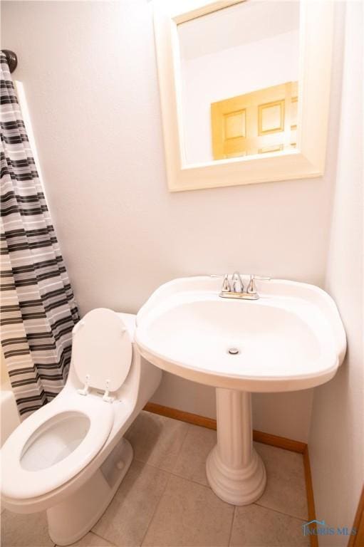 1621 Acorn Dr, Toledo, OH 43615 - bathroom featuring tile patterned flooring and shower / bath combination with curtain