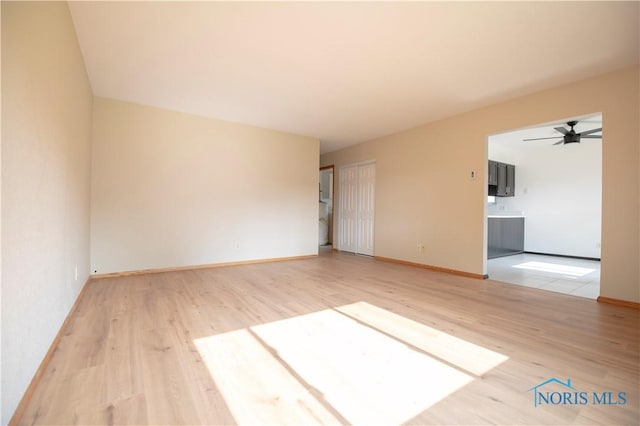 1621 Acorn Dr, Toledo, OH 43615 - empty room with wood finished floors and a ceiling fan
