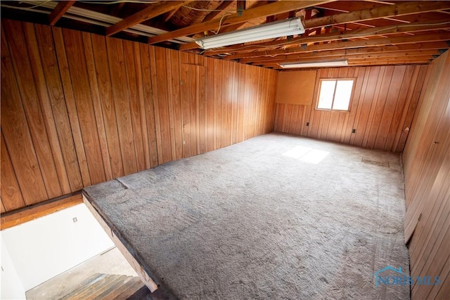 1621 Acorn Dr, Toledo, OH 43615 - below grade area with carpet flooring and wood walls