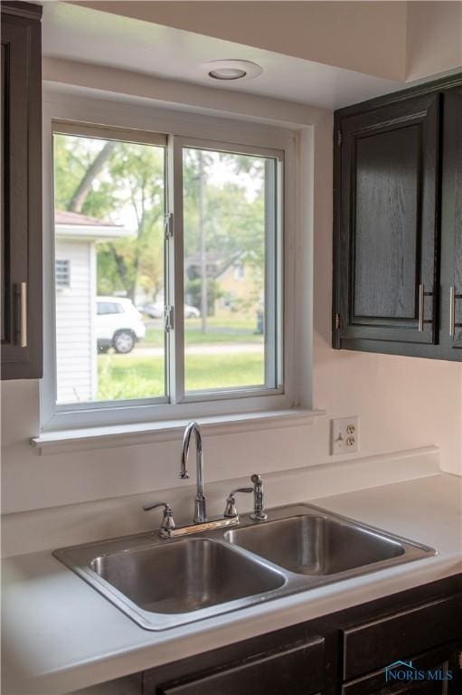 1621 Acorn Dr, Toledo, OH 43615 - kitchen with light countertops and healthy amount of natural light
