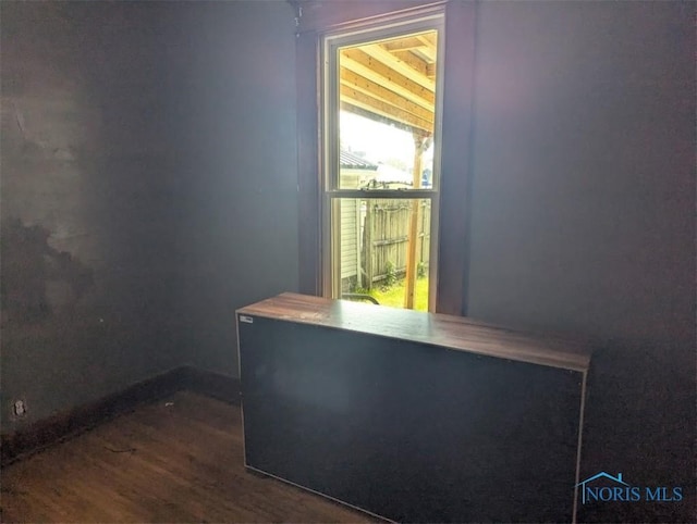 1022 Dodd St, Napoleon, OH 43545 - unfurnished office featuring dark wood-style flooring