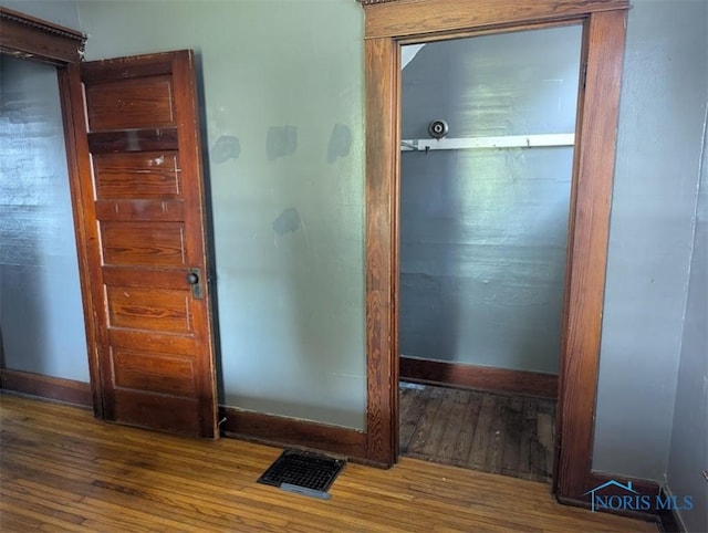 1022 Dodd St, Napoleon, OH 43545 - bathroom featuring hardwood / wood-style flooring and baseboards