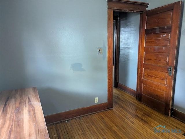 1022 Dodd St, Napoleon, OH 43545 - unfurnished room featuring baseboards and wood finished floors