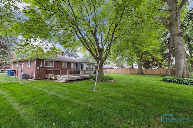 4801 Estero Pl, Toledo, OH 43623 - view of yard with a wooden deck and cooling unit