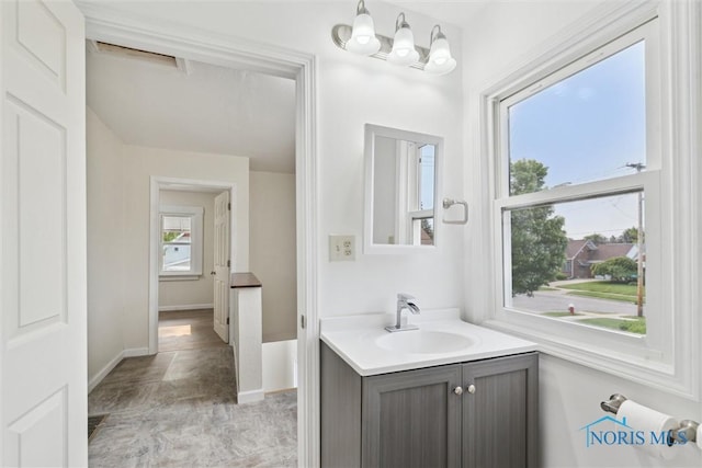 3409 Kirby Pl, Toledo, OH 43608 - bathroom featuring vanity and baseboards
