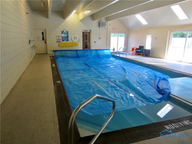 4343 W Bancroft St Unit 2D, Toledo, OH 43615 - indoor pool featuring an AC wall unit
