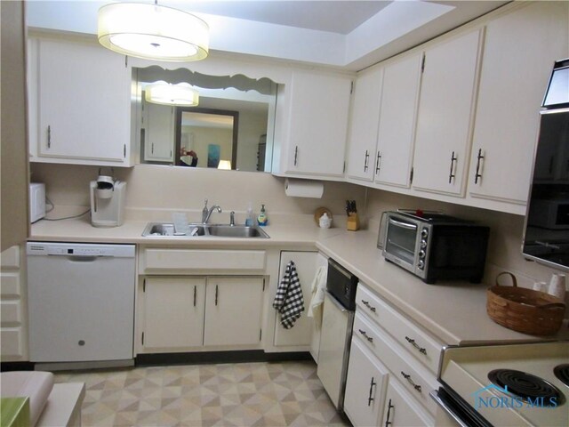 4343 W Bancroft St Unit 2D, Toledo, OH 43615 - kitchen with white dishwasher, a sink, light countertops, and white cabinets