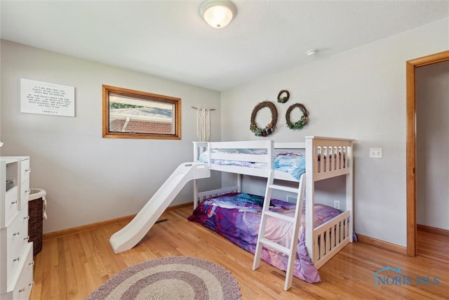 955 Westmont Ave, Napoleon, OH 43545 - bedroom featuring wood finished floors and baseboards
