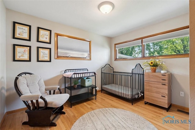 955 Westmont Ave, Napoleon, OH 43545 - bedroom featuring wood finished floors and baseboards