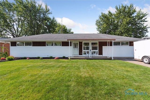 955 Westmont Ave, Napoleon, OH 43545 - single story home with covered porch and a front yard