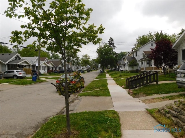1839 Talbot St, Toledo, OH 43613 - view of asphalt road with a residential view and sidewalks