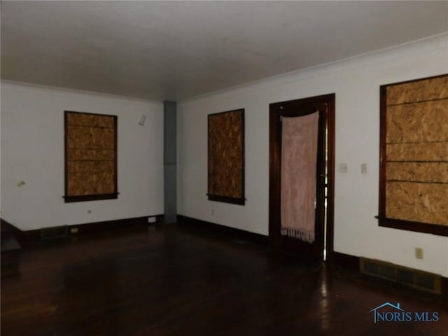 1839 Talbot St, Toledo, OH 43613 - unfurnished room with wood finished floors and ornamental molding