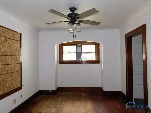 1839 Talbot St, Toledo, OH 43613 - spare room with hardwood / wood-style floors, baseboards, ceiling fan, and ornamental molding