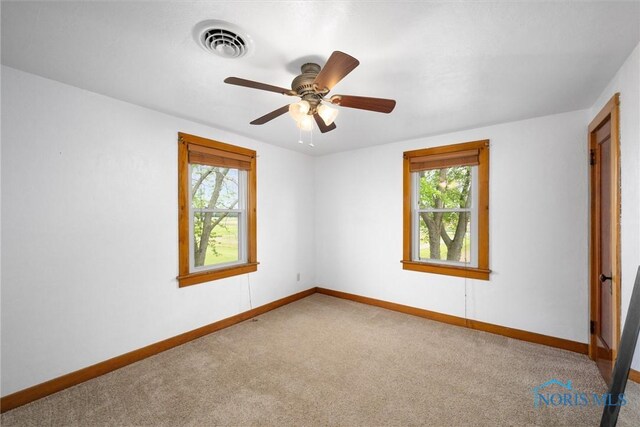15819 County Road D, Wauseon, OH 43567 - carpeted empty room featuring baseboards and ceiling fan