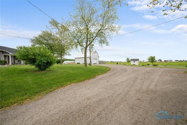15819 County Road D, Wauseon, OH 43567 - view of dirt / gravel road featuring a barn