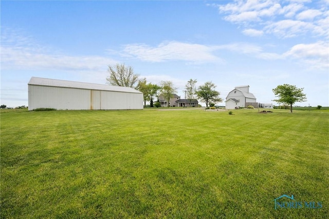 15819 County Road D, Wauseon, OH 43567 - view of green lawn with an outbuilding and an outdoor structure