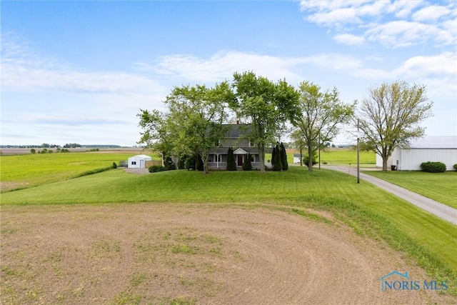 15819 County Road D, Wauseon, OH 43567 - view of property hidden behind natural elements featuring a front yard and driveway