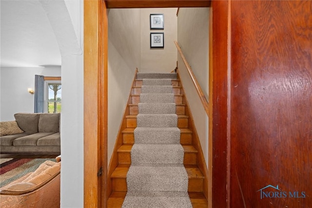 15819 County Road D, Wauseon, OH 43567 - staircase with arched walkways and wood finished floors
