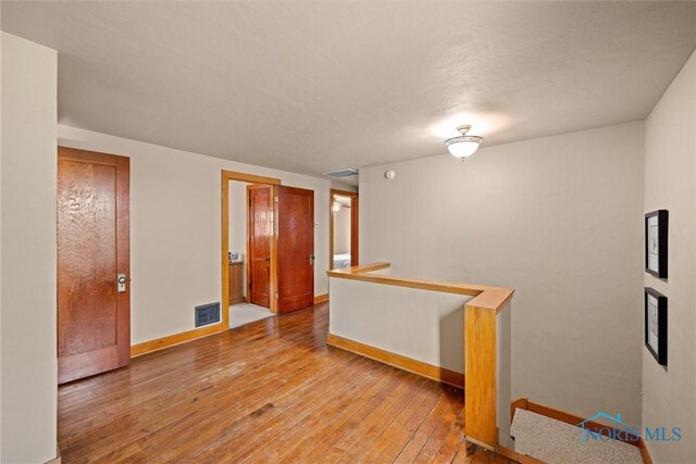 15819 County Road D, Wauseon, OH 43567 - unfurnished room with hardwood / wood-style floors and baseboards