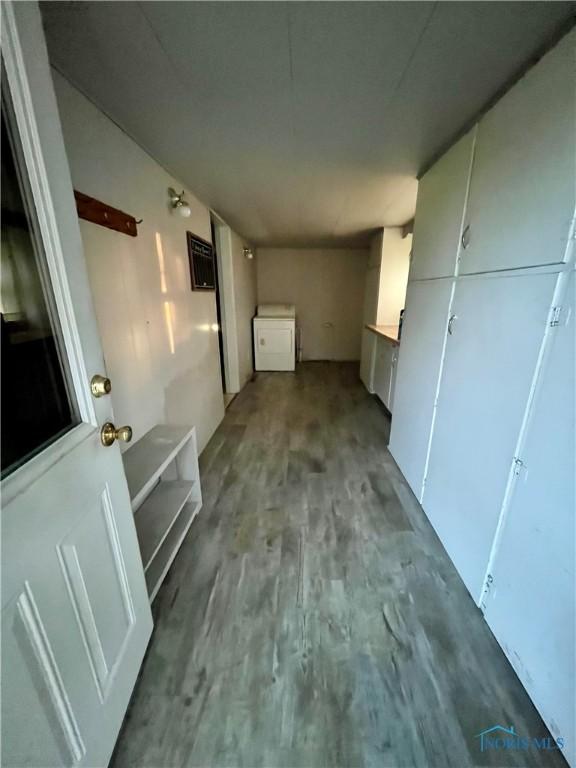 11157 State Route 500, Paulding, OH 45879 - corridor with wood finished floors and washer / clothes dryer