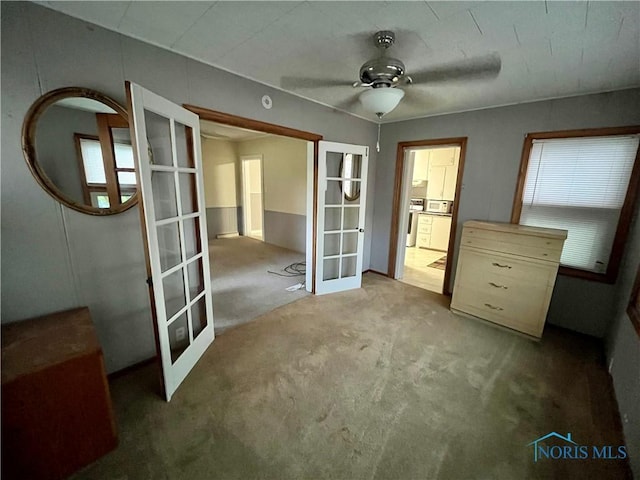 11157 State Route 500, Paulding, OH 45879 - unfurnished bedroom featuring french doors and carpet floors