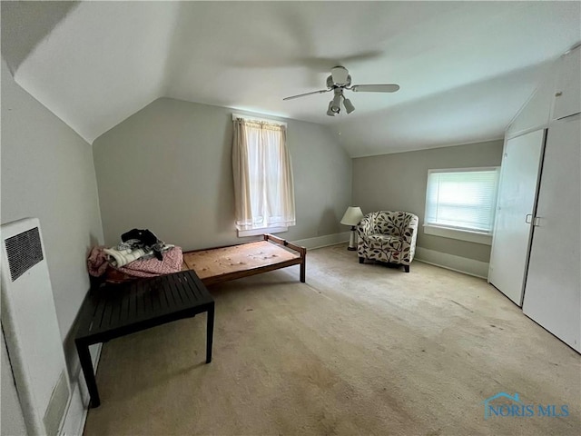 11157 State Route 500, Paulding, OH 45879 - sitting room with lofted ceiling, a heating unit, light colored carpet, ceiling fan, and baseboards