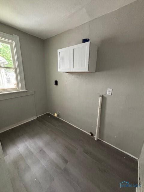 3239 Cherry St, Toledo, OH 43608 - washroom with dark wood-style flooring and baseboards