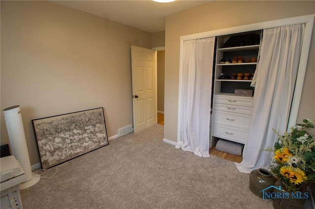 1133 Cuba St, Toledo, OH 43615 - carpeted bedroom featuring baseboards and a closet