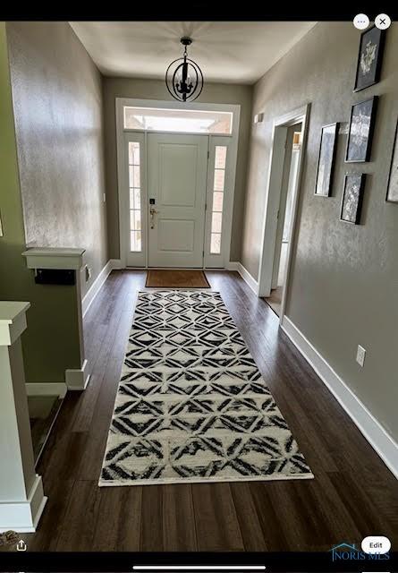17 Crabtree Ct, Swanton, OH 43558 - foyer entrance with dark wood finished floors and baseboards