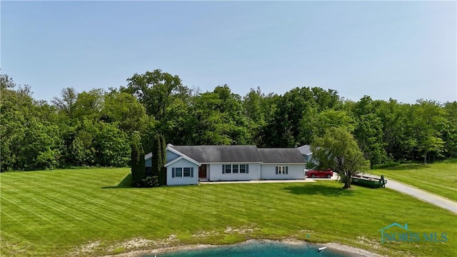 13926 Rd 154, Paulding, OH 45879 - view of front of property with a front lawn and a forest view