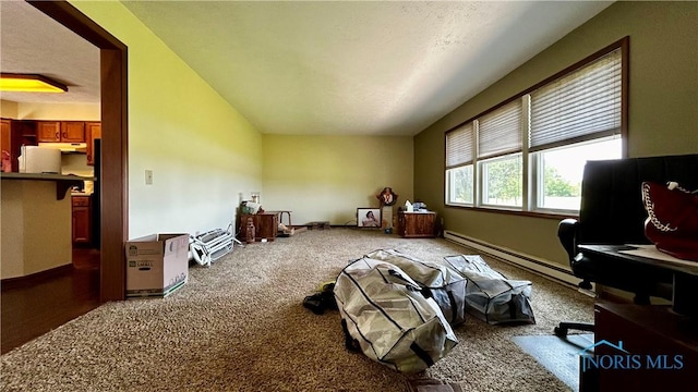 13926 Rd 154, Paulding, OH 45879 - carpeted bedroom featuring a baseboard heating unit