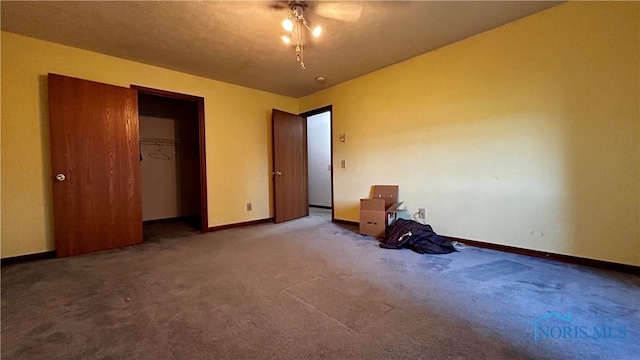 13926 Rd 154, Paulding, OH 45879 - unfurnished bedroom with carpet, baseboards, a ceiling fan, and a closet