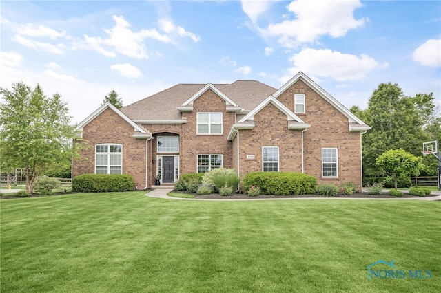 4360 Turtle Creek Dr, Perrysburg, OH 43551 - traditional home featuring brick siding and a front yard